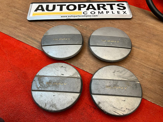 Nissan sunny B11 wheel center caps