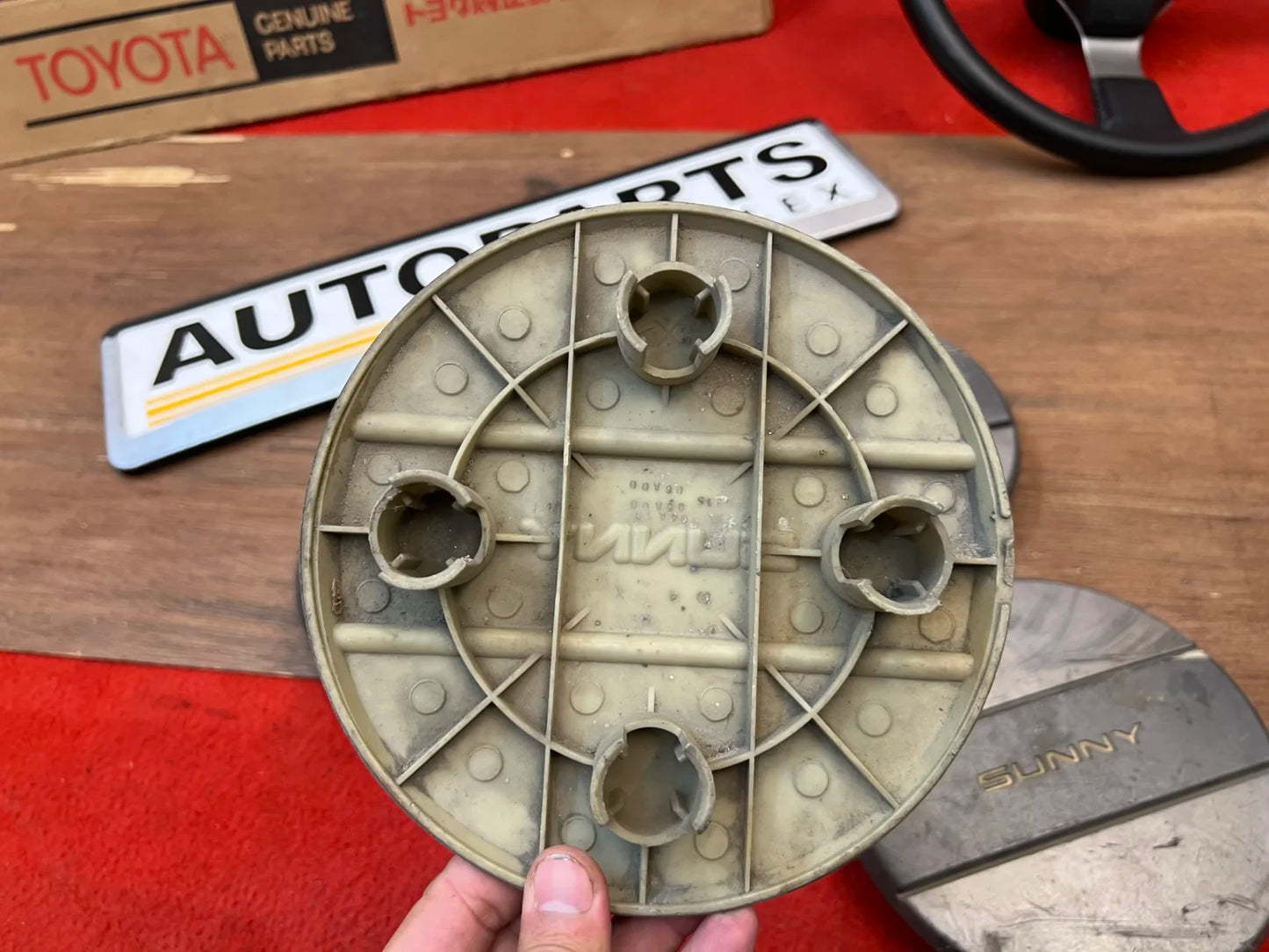 Nissan sunny B11 wheel center caps